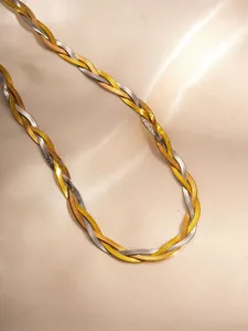 Detail of tricolor braided flat snake chain necklace in gold silver and rose gold tones