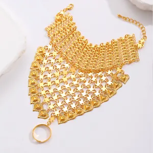 Golden Middle Eastern style bracelet-ring with heart pendants and mesh wristband