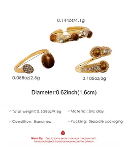Detailed size chart for a 3-piece gold zinc alloy ring set with brown tiger eye stones
