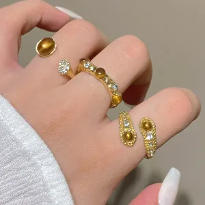 Maillard tiger eye stone gold ring set with diamonds and hammered texture for women