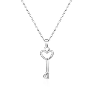 Minimalist silver 18K heart key pendant necklace for women on white background