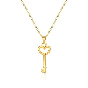 Elegant 18K gold-plated heart-shaped key pendant necklace on a delicate fine link chain