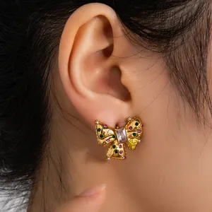 Boucles d'oreilles nœud papillon avec gemmes colorées plaquées or 18 carats
