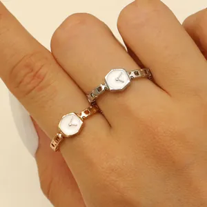 Unique clock-face ring in gold and silver finish with hollow chain band for women