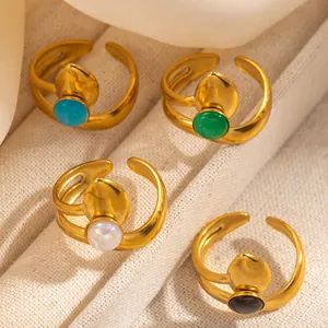 Adjustable gold stainless steel ring set with multi-colored gemstones and leaf accents