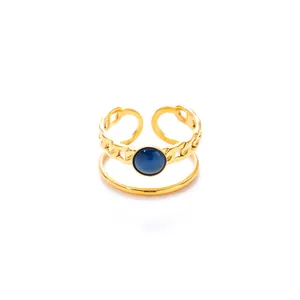 Double-layered gold titanium ring featuring chain texture and a blue cat-eye stone inlay