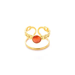 Detail of 18k gold plated double-layer ring featuring chain design and orange stone