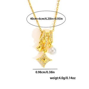 Detail of gold chain necklace featuring star charms and pearl with 40cm plus 6cm extension