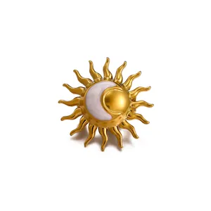 Broche vintage élégante soleil et lune dorée avec rayons et incrustation nacrée