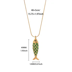 Detailed view of green fish pendant necklace with chain length and size measurements