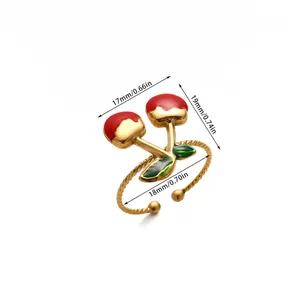 Detailed view of enamel cherry open ring with golden twist band and sizing measurements
