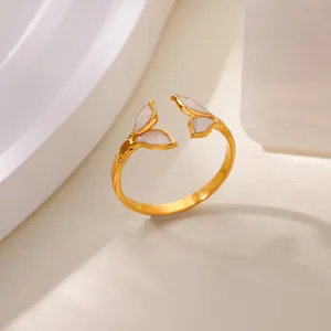 Adjustable golden stainless steel open ring with white enamel flower petals and brushed texture