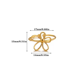 Detailed view of hollow flower ring with polished gold finish and size measurements