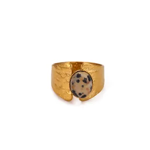 Minimalist wide open ring with hammered gold texture and dalmatian jasper stone
