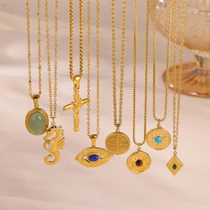 Elegant gold stainless steel necklaces with emerald stones and various vintage pendants