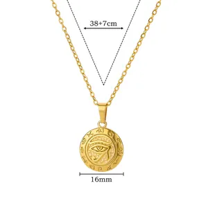Detail view of 16mm gold Eye of Horus coin pendant with 38+7cm stainless steel chain