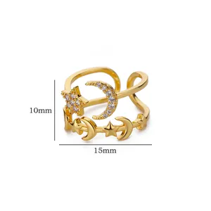 Macro detail of gold moon and star ring with white zircons showing 15mm width dimension