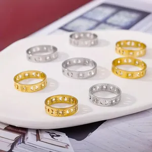 18K vergulde roestvrijstalen ringen met holle zon- en maanpatronen in goud en zilver