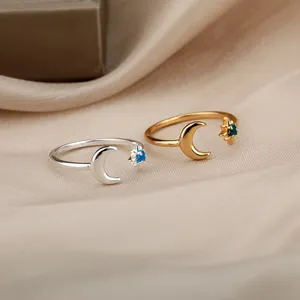 Minimalist moon and star adjustable rings in gold and silver with inlaid moonstones