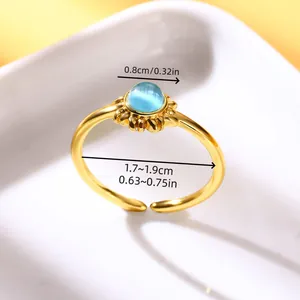 Detailed view of adjustable golden moonstone ring with precise size measurements in cm and in
