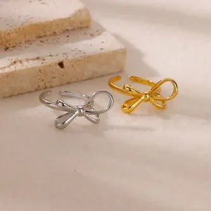 Bagues de couple Mobius réglables en or et argent avec nœud papillon élégant