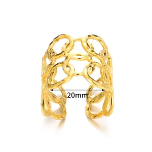 Detail view of gold geometric wide hollow ring with adjustable open band and 20mm diameter