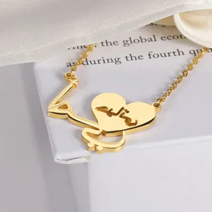 Gold heart necklace with Arabic calligraphy pendant in a white luxury jewelry gift box