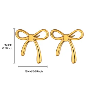 Detailed view of gold bow earrings with precise 15mm size dimensions and polished finish