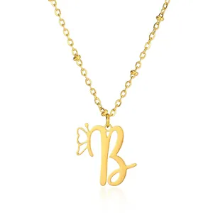 Detail view of gold stainless steel necklace with letter B and butterfly pendant charm