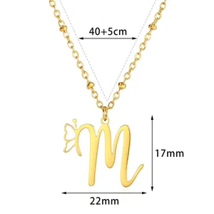 Detail of gold stainless steel necklace showing the 'M' letter and butterfly pendant dimensions
