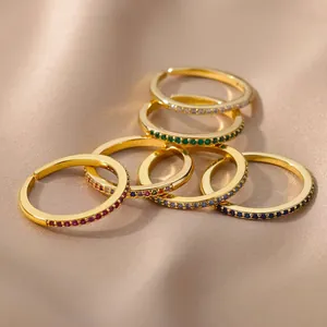 Detailed close-up of six adjustable 18K gold-plated rings with colorful zircon stones
