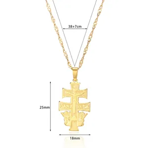 Detailed view of golden Caravaca Cross pendant with measurements 25mm by 18mm and rope chain