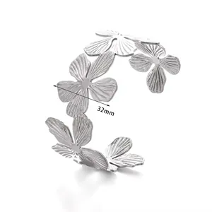 Bracelet manchette en acier argenté avec motif floral texturé de 32 mm pour femme