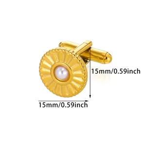 Macro detail of 15mm gold-plated fan-shaped cufflink with a central white pearl inlay