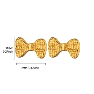 Detail showing 7x12mm golden bow stud earrings with textured waffle pattern and dimensions