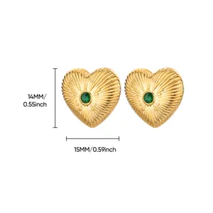 Detail shot of heart earrings with green gemstone showing 15mm width and 14mm height
