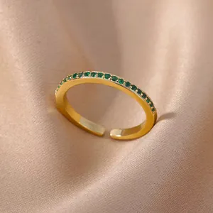 Elegant 18K gold plated ring featuring a sparkling row of round green zircon gemstones