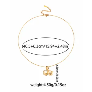 Detailed specs showing a golden shell necklace with pearl and star pattern, 40.5cm chain