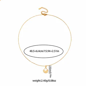 Detail view of scallop shell pendant necklace with pearl and dimensions measurements