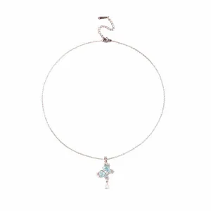 Detail of blue zircon butterfly pendant showing S.STEEL hallmark on the rose gold chain