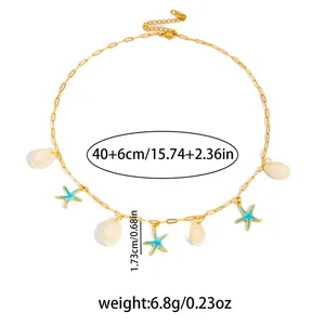 Set collana con stella marina e conchiglia dorata con catena a graffetta e ciondoli