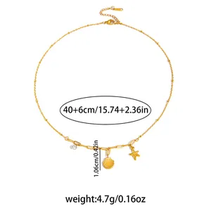 Set collana dorata con stella marina, conchiglia, ciondolo di cristallo e catena a graffetta