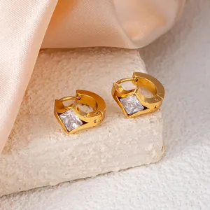 Golden titanium steel hoop earrings featuring square-cut clear zircon stones