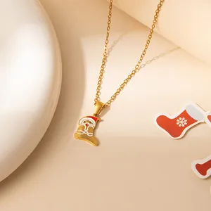 Collier en acier inoxydable doré avec pendentif Père Noël dans une botte de Noël