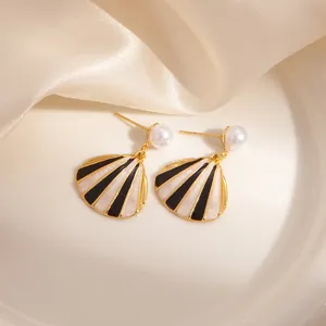 French vintage shell earrings with black and white enamel stripes and pearl stud
