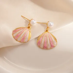 Pink enamel scallop shell earrings with round faux pearls and golden hardware