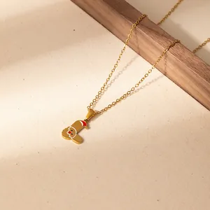Collier pendentif bonhomme de pain d'épices doré avec chapeau de Noël rouge et chaîne