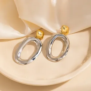 Boucles d'oreilles géométriques bicolores minimalistes or et argent au fini miroir