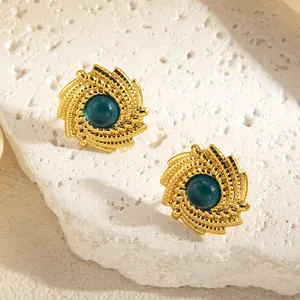 Vintage spiral gold-plated studs with teal round stone centers for women