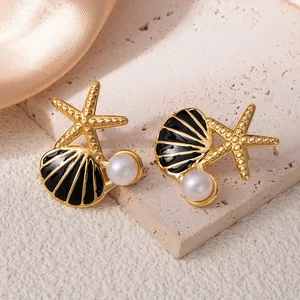 Boucles d'oreilles étoile de mer et coquillage dorées avec perle sur pierre